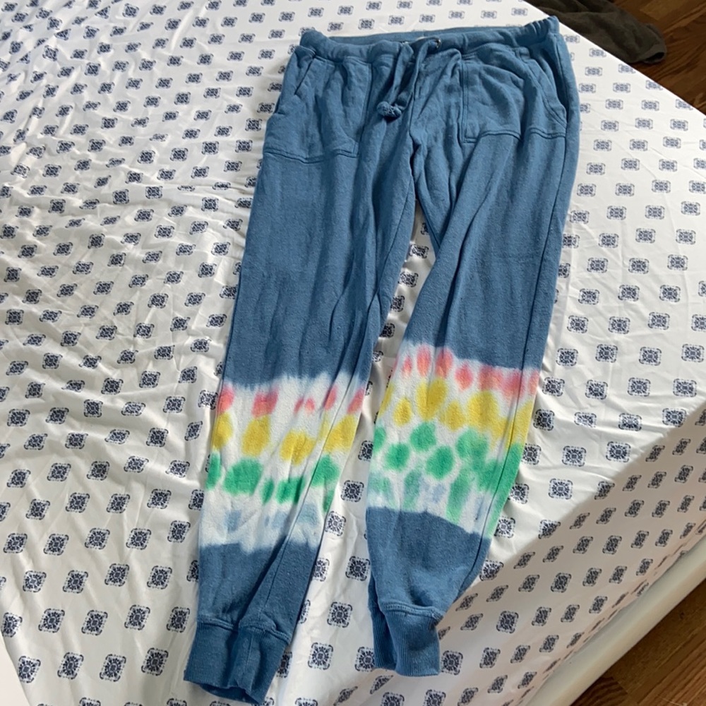 Blue sweatpants with tye dye at the bottom